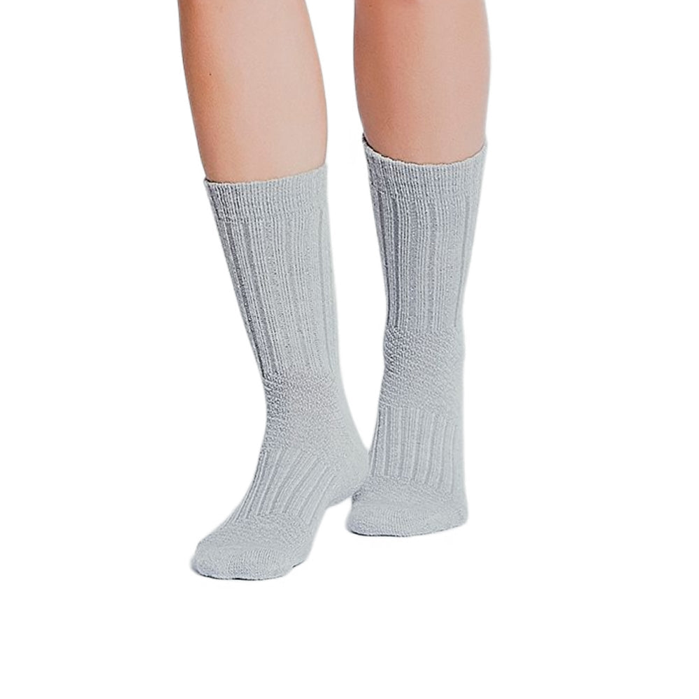 Light grey baby alpaca crew socks worn on bare legs, front view