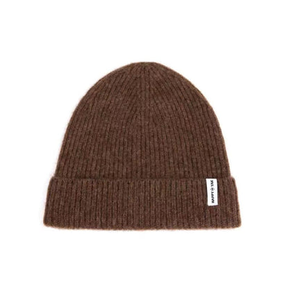 Brown yak cashmere gloves, beanie and socks bundle laid out